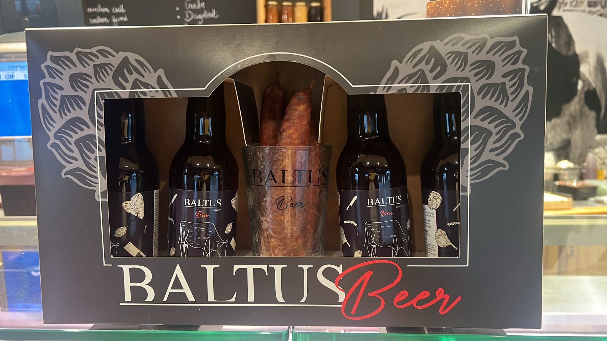 Photo du produit Colis bières 4 bouteilles + 1 verre + 3 saucissons